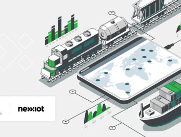 Logotypes of Nexxiot and TRIG next to rail wagon and ship with loaded digitized cargo and containers transmit data to tablet